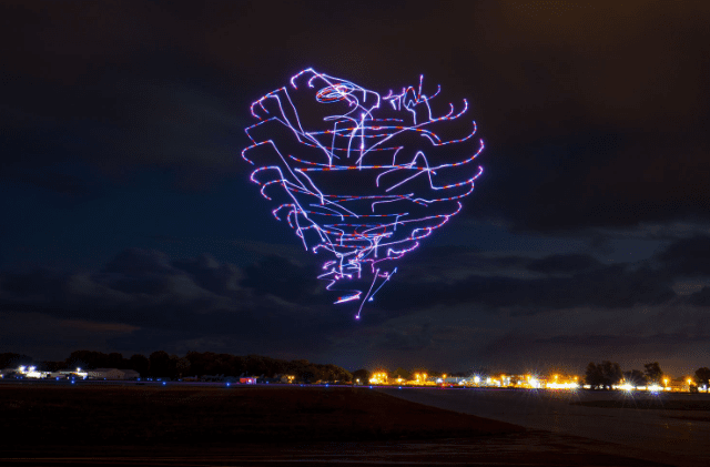 A heart shaped light painting in the sky.