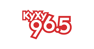 A red and white logo for the radio station kyxy 9 6. 5